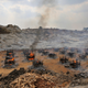 Funeral pyres for 25 separate people burn at a granite quarry near Bengaluru, India, in May 2021.
